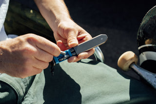 A bit being removed from the storage area of The Warrick EDC screwdriver.