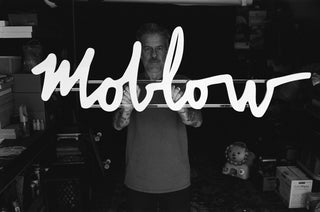 Mark Oblow holding a Moblow sign.