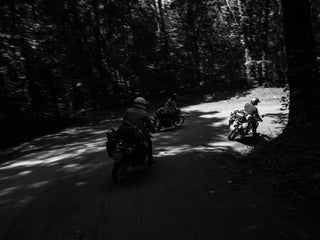 under open air black and white motorcycles 