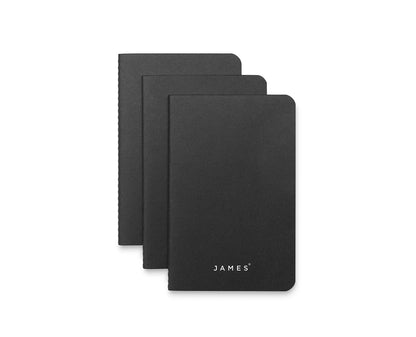 Multiple James Brand daily notebooks in off-stacked position.