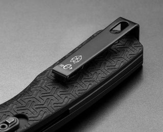 The clip of The Carter EDC pocket knife with Carryology styled handle.