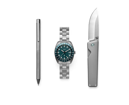 The TJB x Timex Daily Essential Capsule with a titanium pen, watch, and pocket knife.