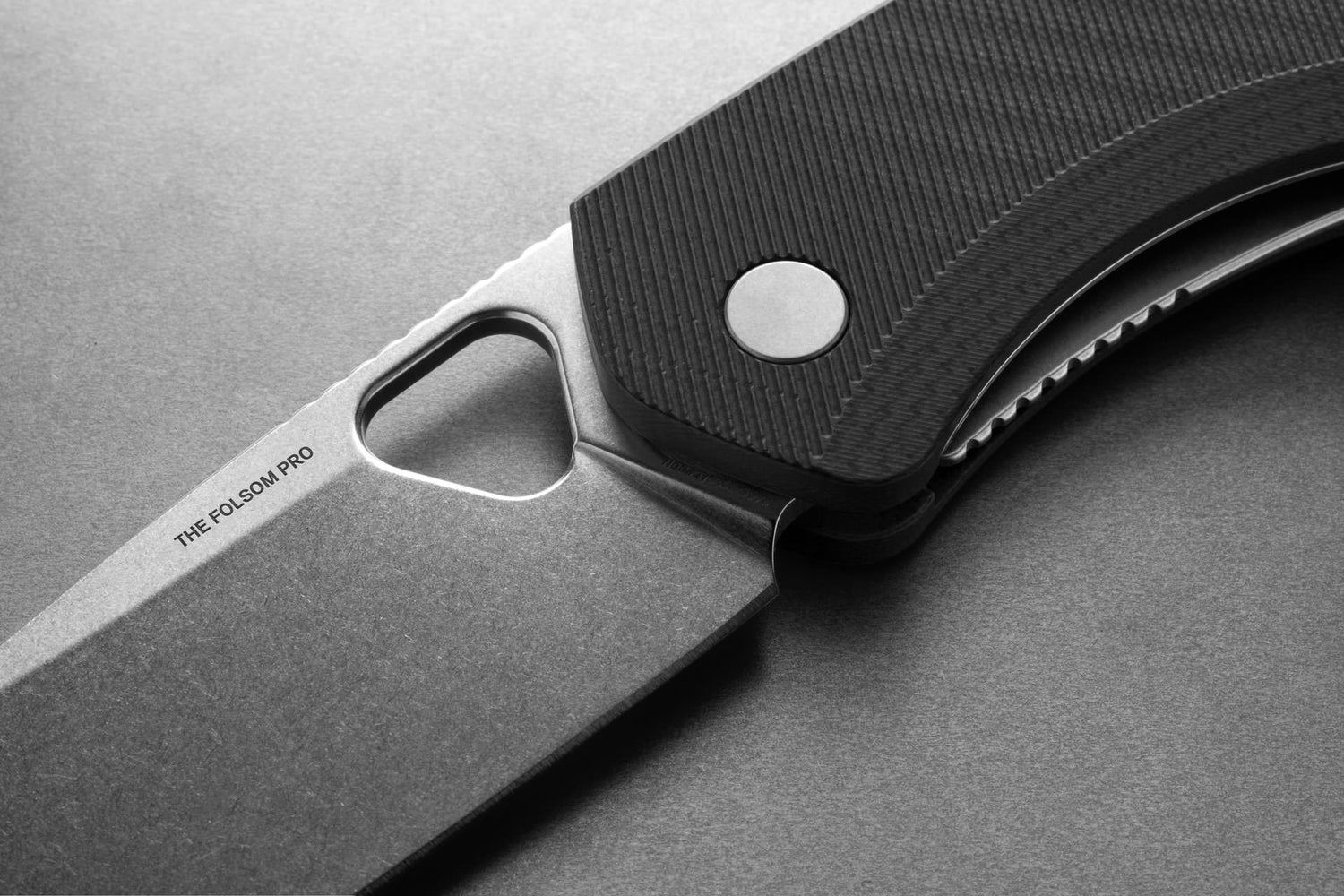 A close up of the thumbhole and pivot of The Folsom Pro EDC pocket knife.