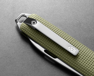 The pocket clip of the Ellis ultra slim slip joint folding pocket knife in grove and stainless.