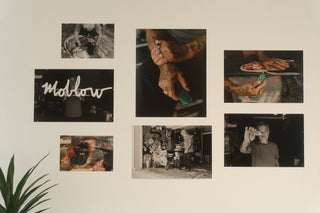 Photos on a wall from Mark Oblow.
