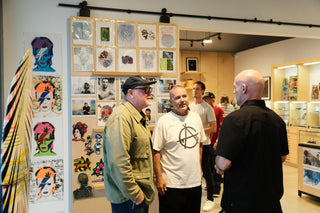 People chatting at a party at the James Brand headquarters in Oceanside, CA.