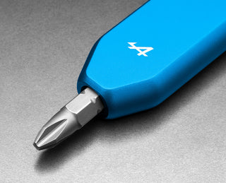 The bit driver of The Warrick EDC screw driver in the Alpine F1 formula one colorway.