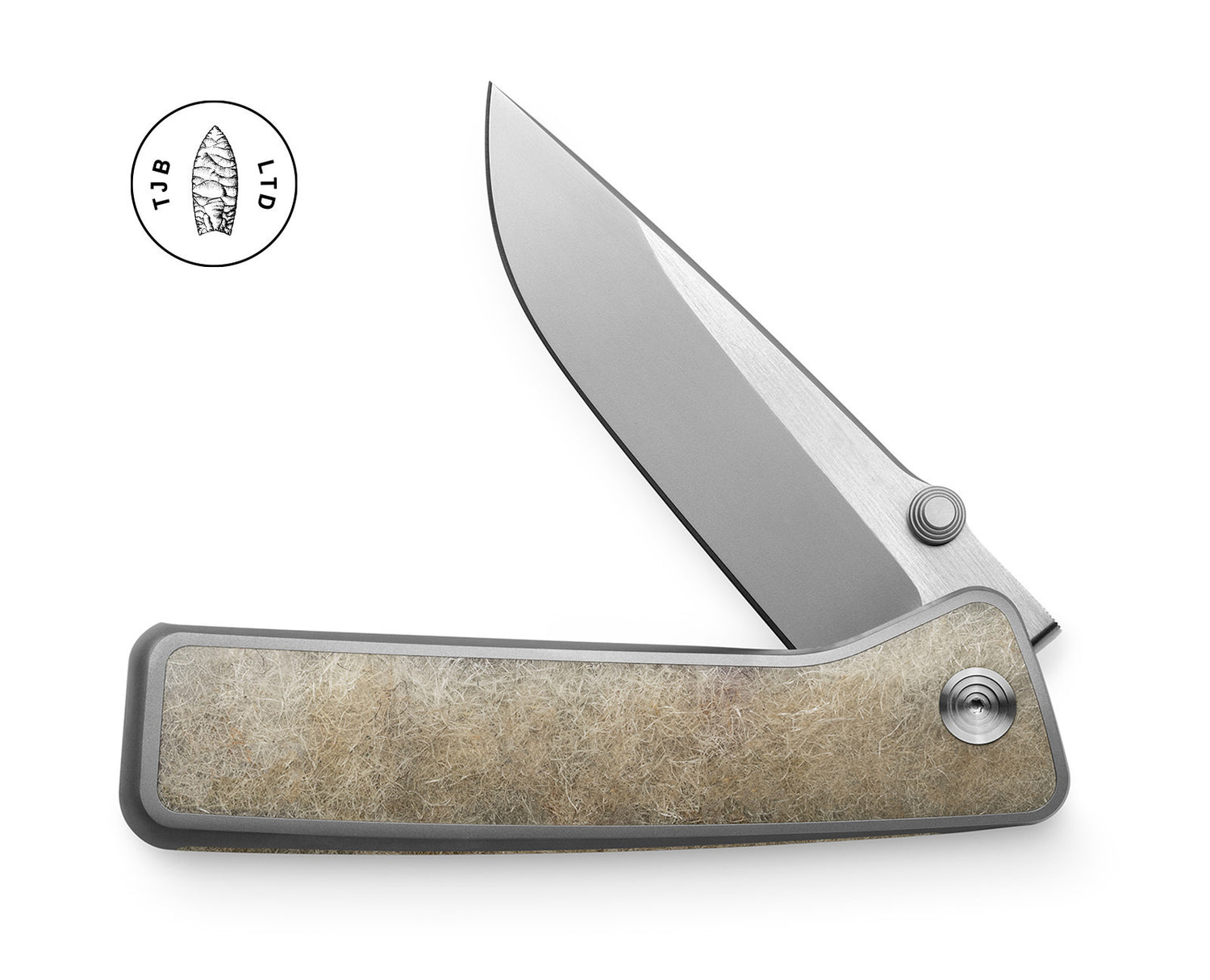 The Barnes limited edition integral pocket knife in titanium and solidwool.