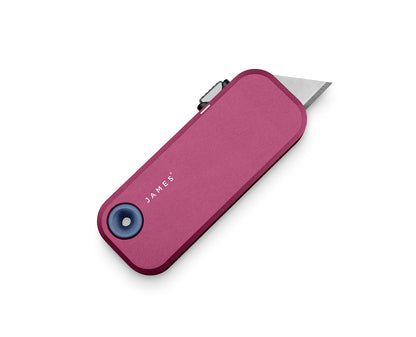 The Palmer utility box cutter in Mulberry and Deep Blue.
