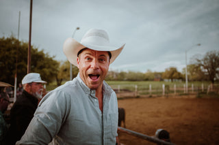 Josh Rosen smiling before trying to ride a bull.