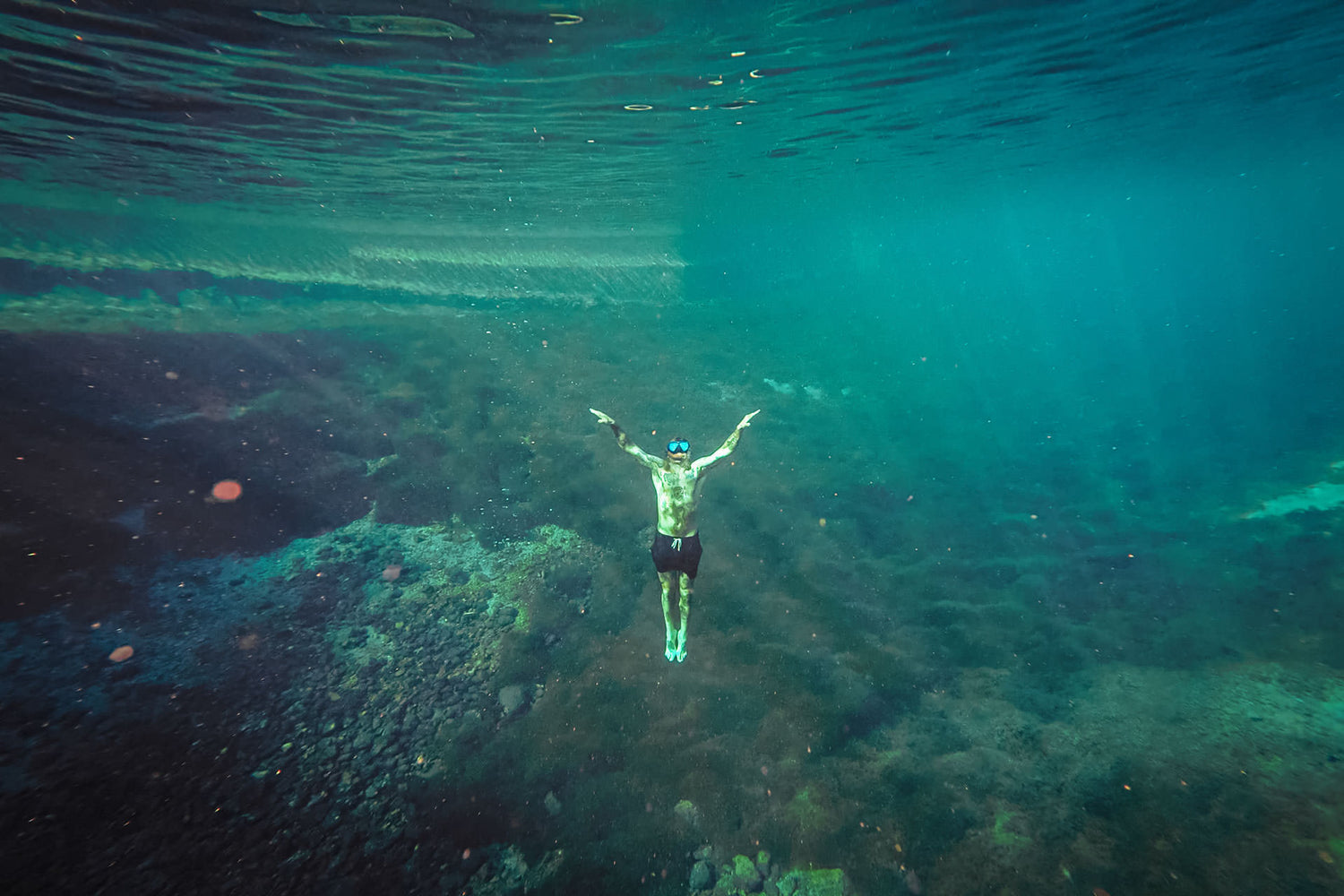 Josh Rosen deep underwater.