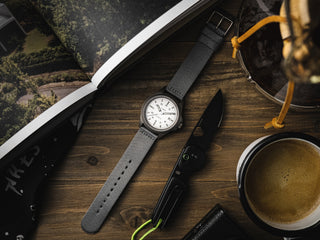 timex watch laydown on table
