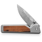 The Chapter knife with rosewood handle and decorative stainless steel blade.