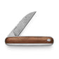 The Pike knife with rosewood handle and damasteel blade.